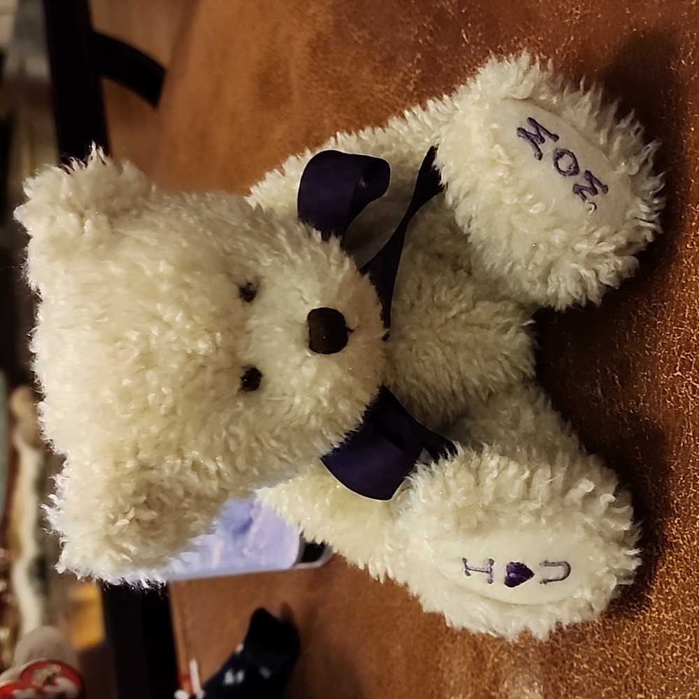 This is a vintage Boyds Bear. It is Marion T Bearlove. Style # is 82514